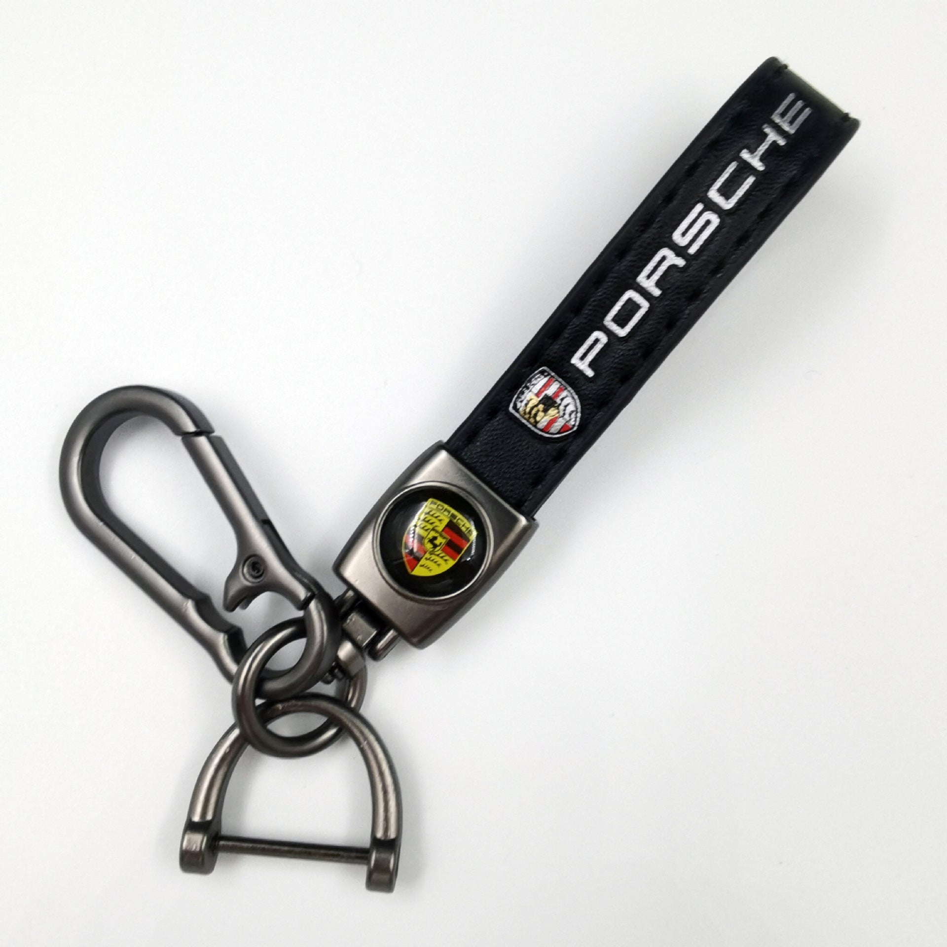 Sleek Black Leather Keychain with Eye-Catching Emblem & Secure Carabiner